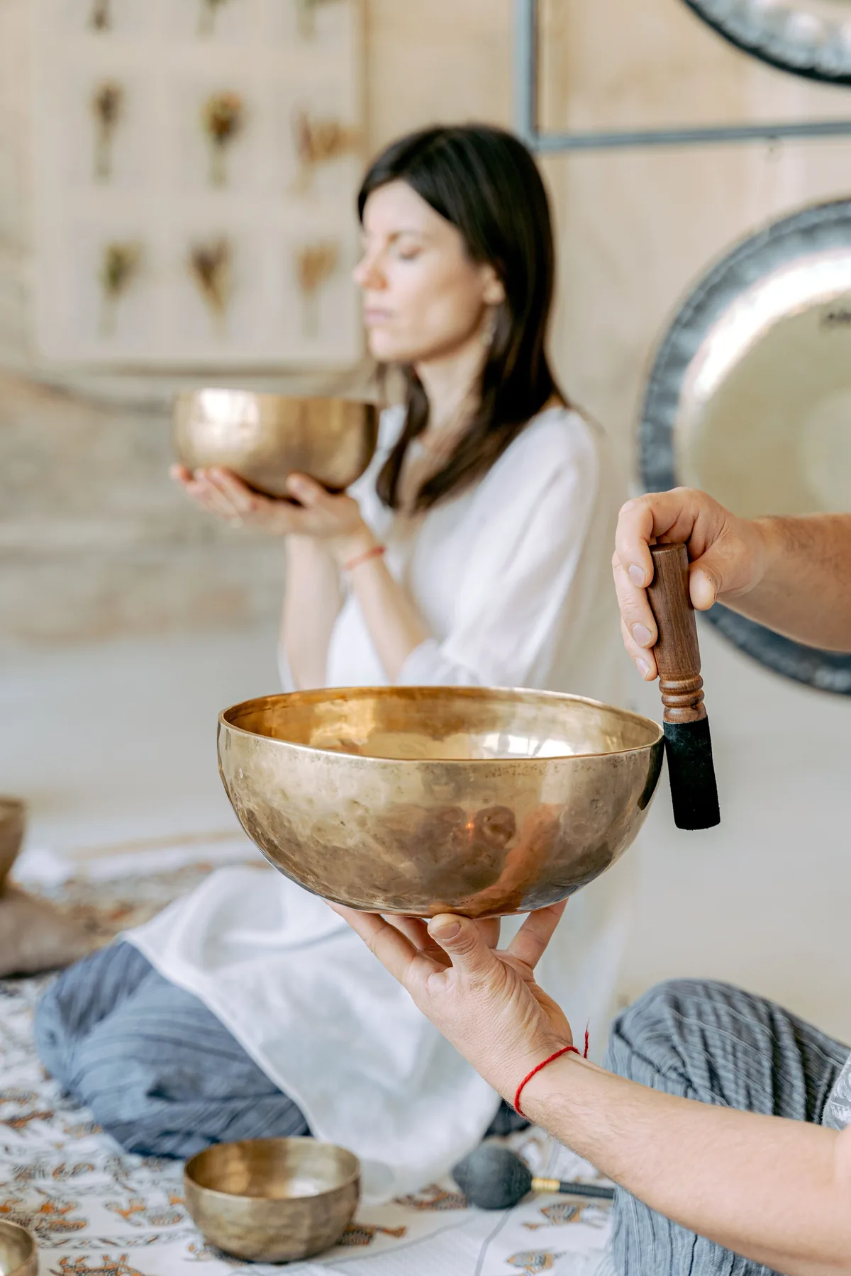 Sound healing ritual with singing bowls