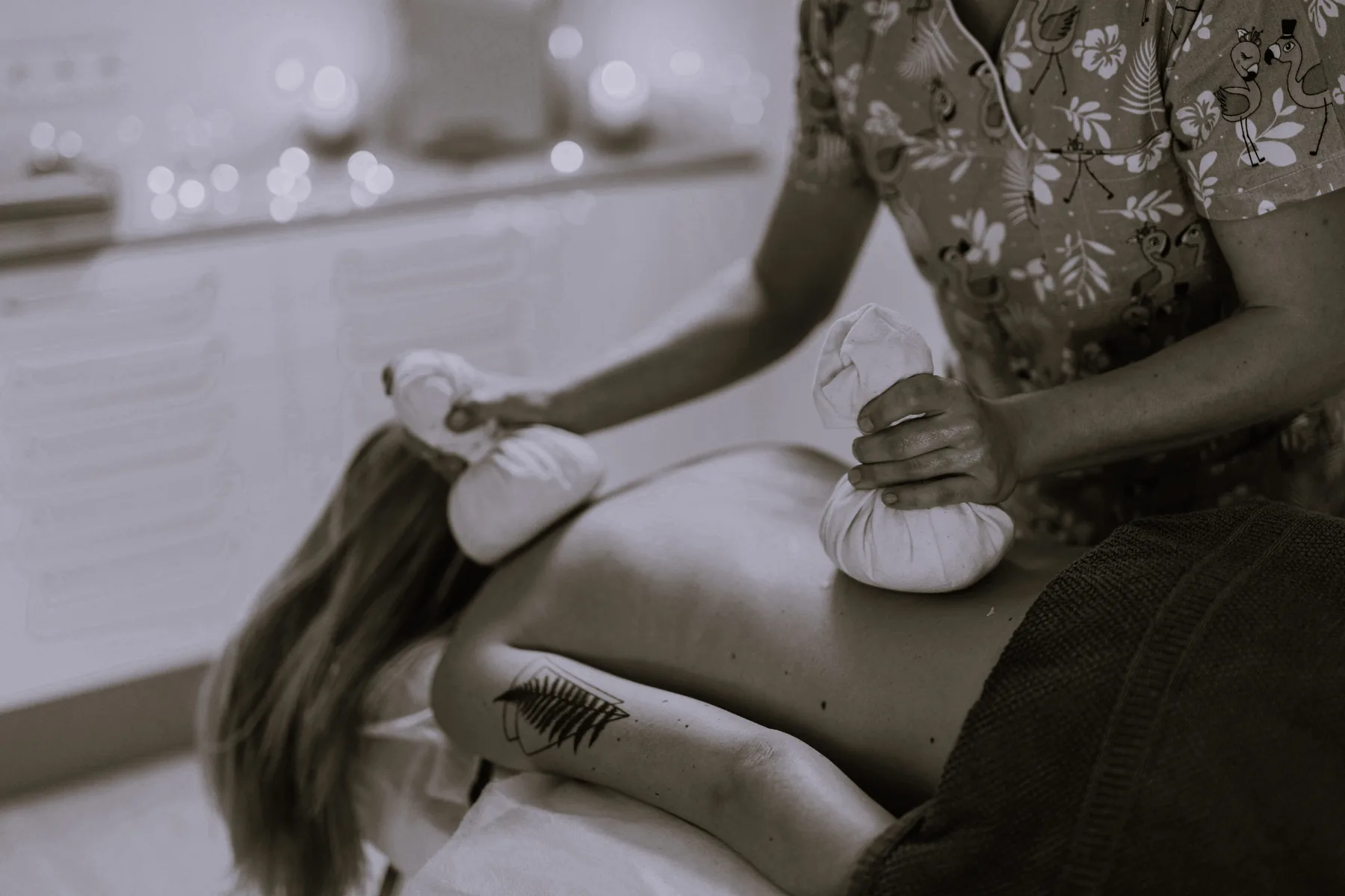 Ayurvedic herbal body treatment by candlelight.