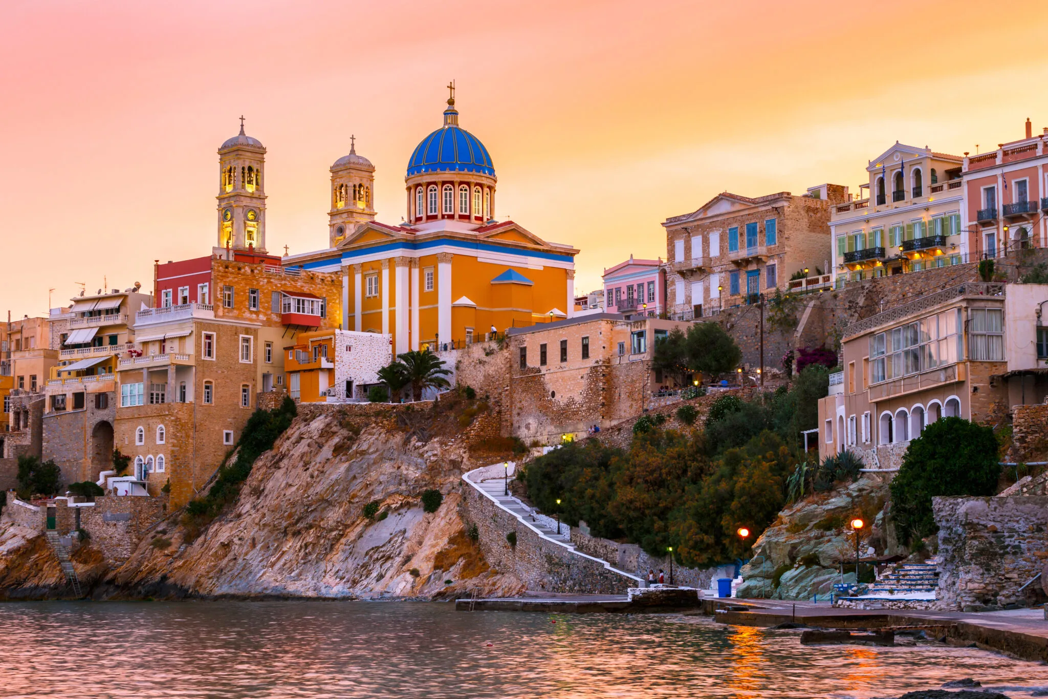 Vaporia — neoclassical Ermoupoli houses above the sea.